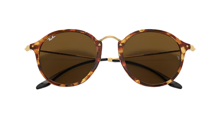 Round Ray-Ban sunglasses with tortoiseshell frame and brown lenses on a white background