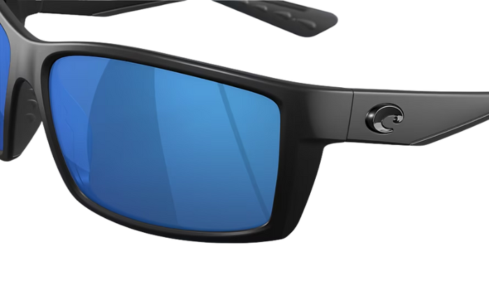 Black Costa sunglasses with blue lenses on a white background