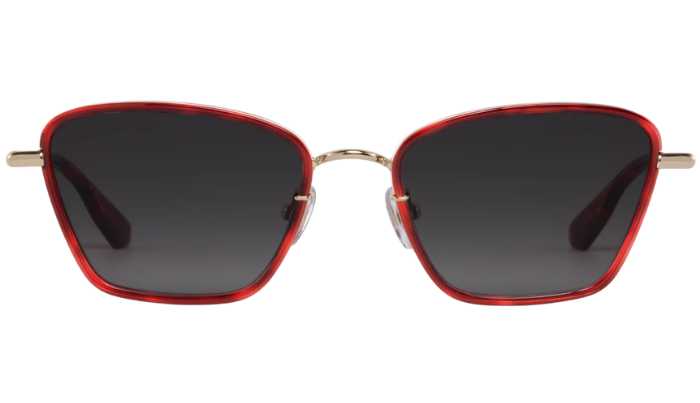 Krewe sunglasses with red frames and dark lenses on a white background
