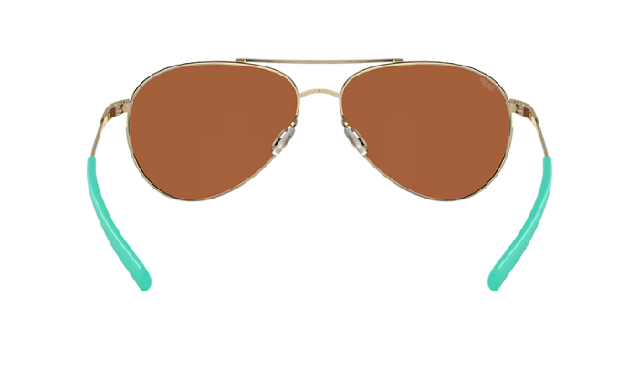 Costa Aviator sunglasses with green reflective lenses on a white background