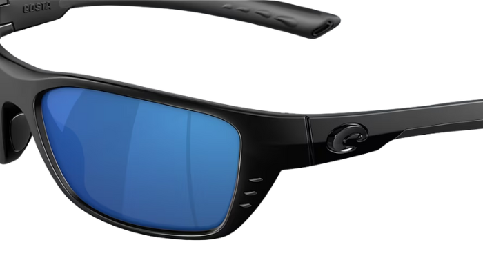 Black Costa sunglasses with blue lenses on a white background