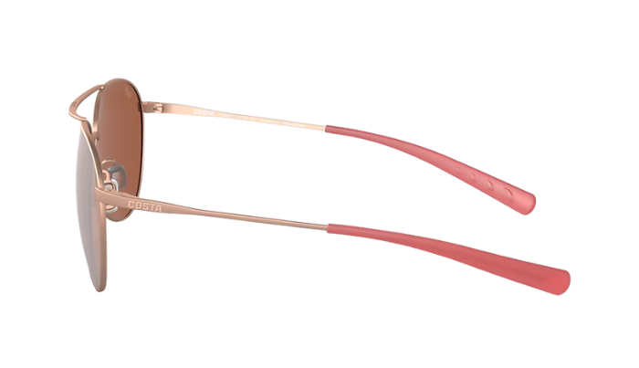 Costa Aviator sunglasses with rose gold frame and copper silver mirror lenses on a white background