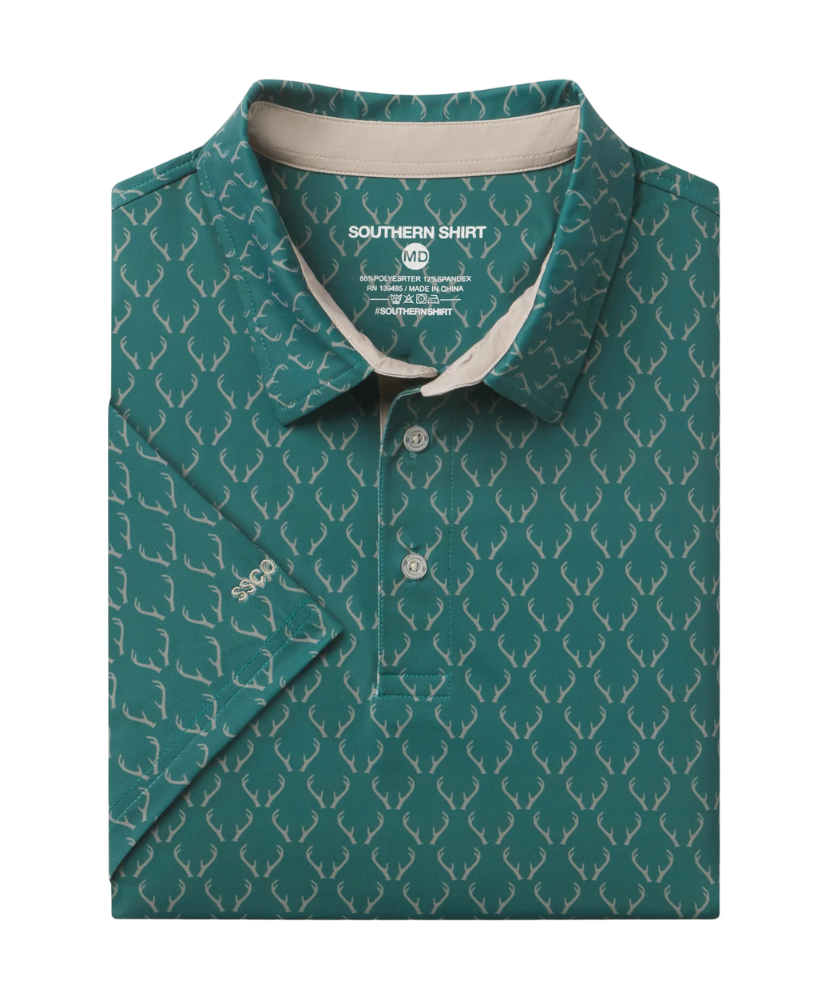 Green polo shirt with deer antler pattern on a white background