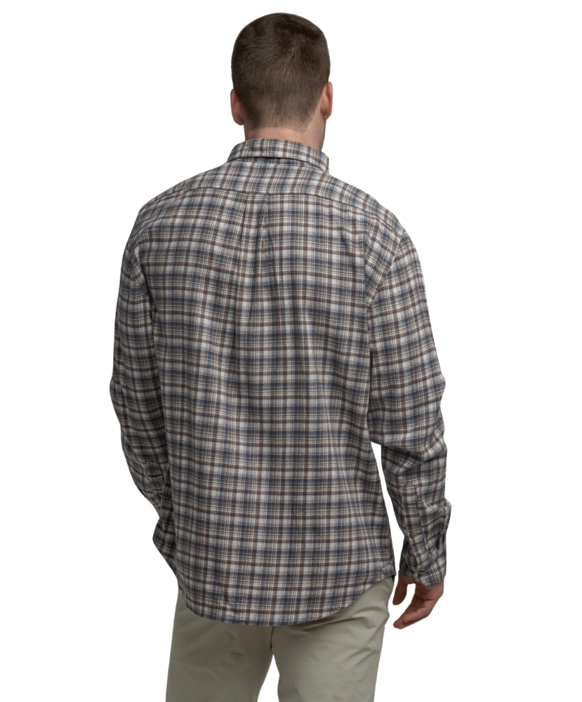 Man wearing a plaid shirt on a white background
