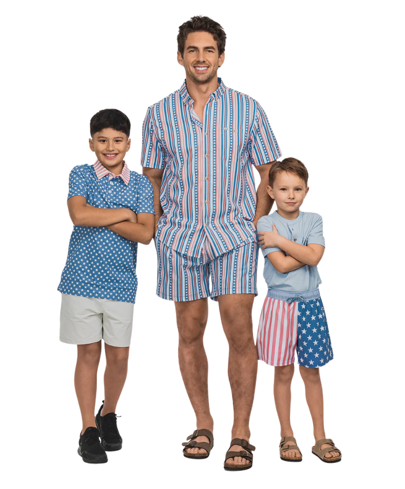 Man and two boys wearing matching USA outfits on a white background