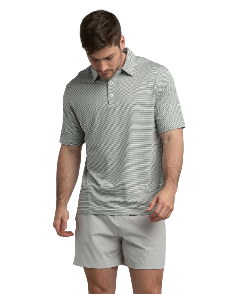 Man wearing a gray striped polo shirt and shorts on a white background