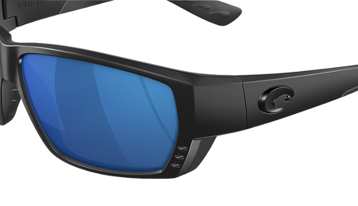 Black Costa wraparound sunglasses with blue lenses on a white background