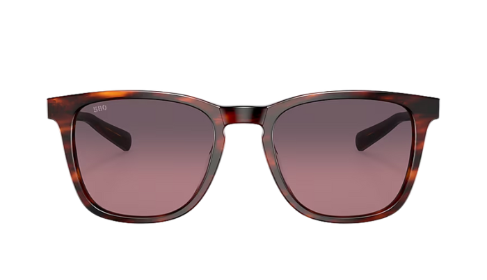 Costa Sunglasses with tortoiseshell frame and rose lenses on a white background