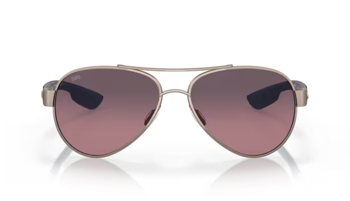 Aviator Costa sunglasses with a gradient pink lens on a white background