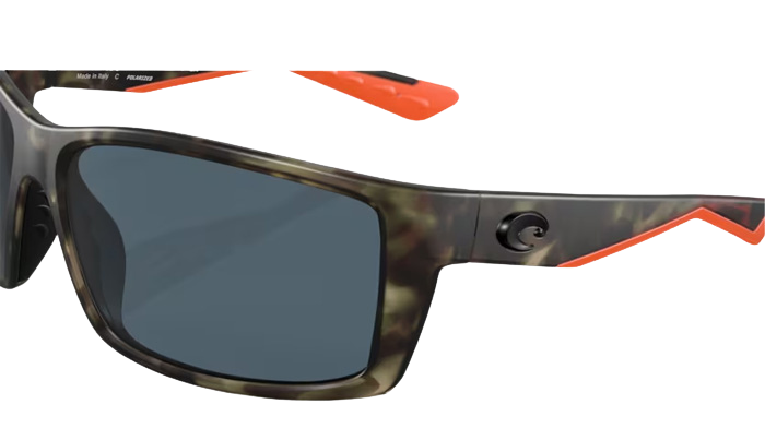 Camoflage Costa sunglasses with gray lenses on a white background