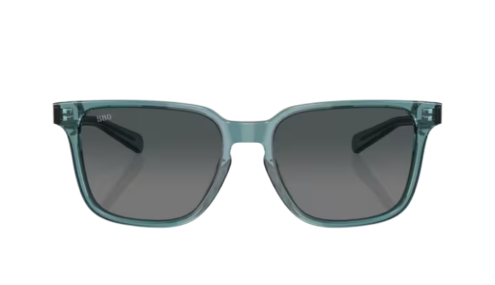 Teal crystal Costa sunglasses with a gray gradient polarized lens on a white background