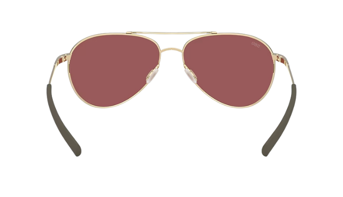 Costa Aviator sunglasses with gold frame and gold mirror lenses on a white background