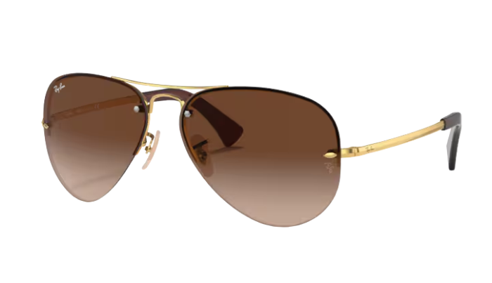 RayBan Aviator sunglasses with gold frame and brown gradient lenses on a white background