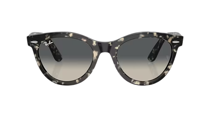 Ray-Ban Sunglasses with tortoiseshell frame and gradient lenses on a white background