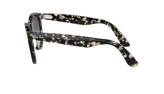 Ray-Ban Sunglasses with tortoiseshell frame and gradient lenses on a white background