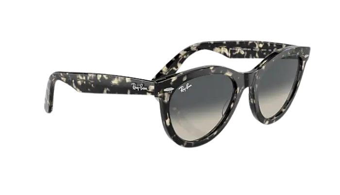 Ray-Ban Sunglasses with tortoiseshell frame and gradient lenses on a white background