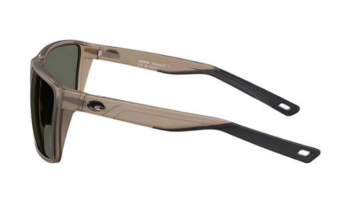 Costa Sunglasses with a transparent matte brown frame and gray lenses on a white background