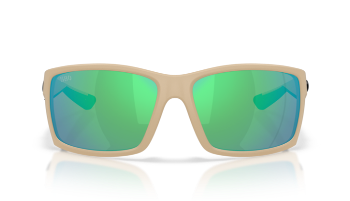 Beige Costa sunglasses with green polarized reflective lenses on a white background
