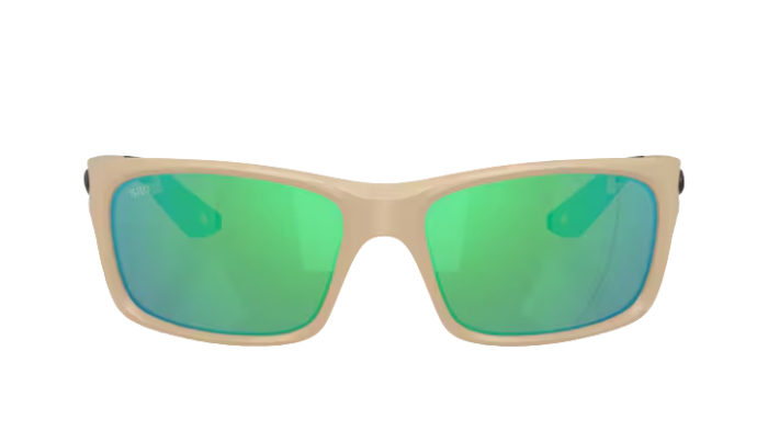Matte sand Costa sunglasses with green polarized reflective lenses on a white background