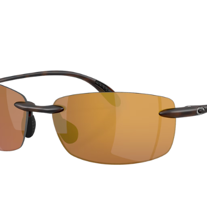 Costa Sunglasses with gold polarized lenses and tortoise frame on a white background