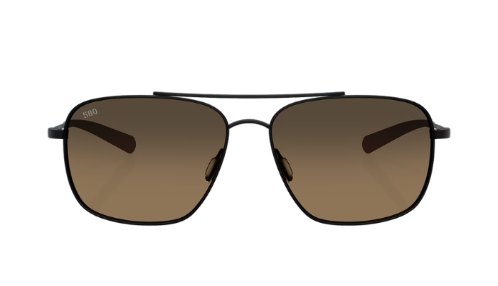 Costa Sunglasses with polarized brown gradient lenses and a black frame on a white background