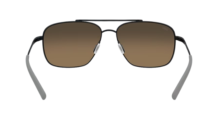 Costa Sunglasses with polarized brown gradient lenses and a black frame on a white background