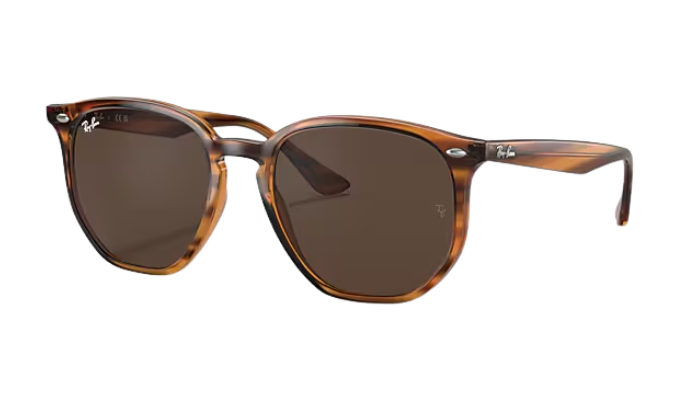 Brown Ray-Ban tortoiseshell sunglasses with dark lenses on a white background