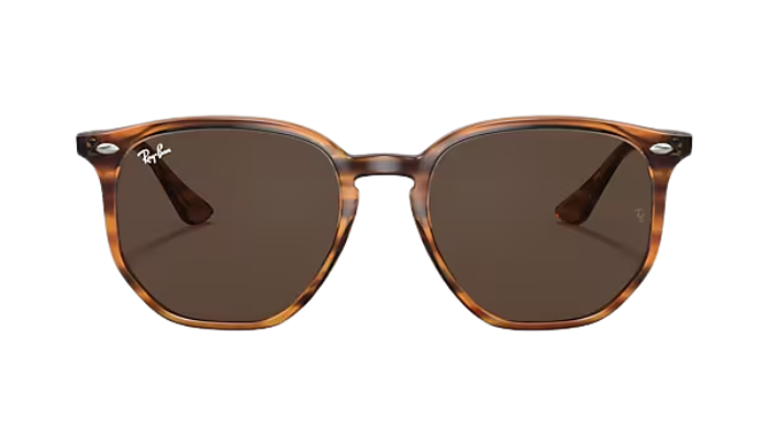 Brown Ray-Ban tortoiseshell sunglasses with dark lenses on a white background