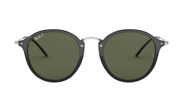 Round Ray-Ban sunglasses with black frames and green polarized lenses on a white background
