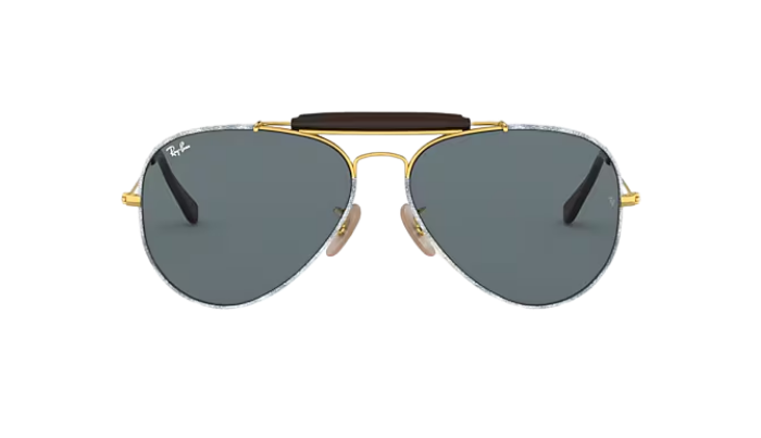 Aviator Ray-Ban sunglasses with denim gold frame and dark lenses on a white background