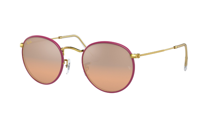 Round Ray-Ban sunglasses with pink gradient lenses and gold frames on a white background