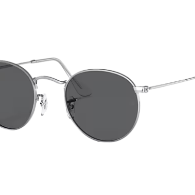 Round sunglasses with dark lenses and thin metal frame on a white background