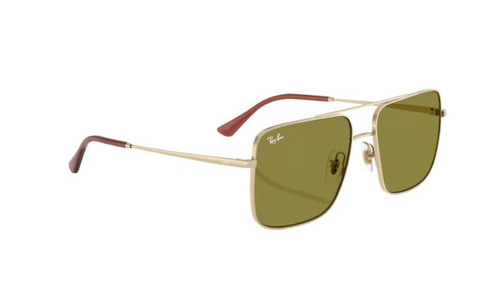 Gold-framed sunglasses with green lenses on a white background