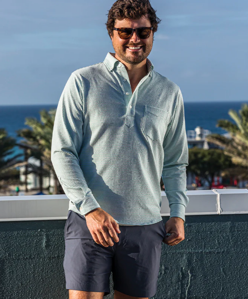 Green and white seersucker striped Onward Reserve Drift shirt on a white background