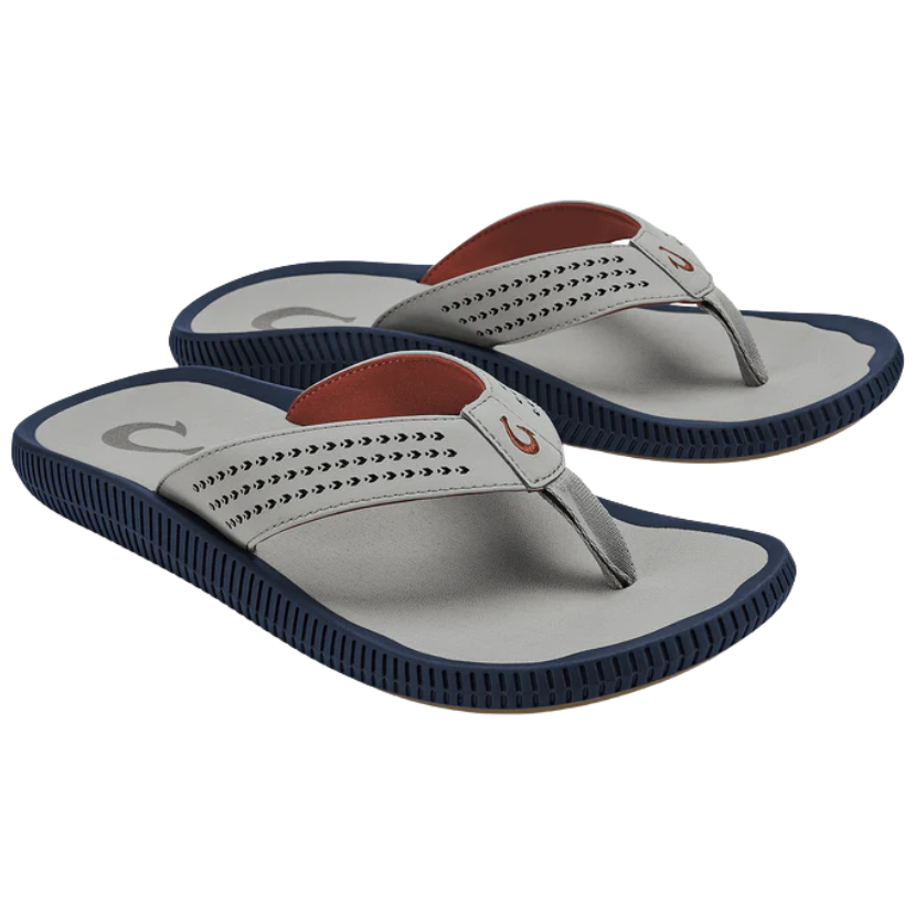 Pair of gray sandals with navy soles and brown insoles on a white background