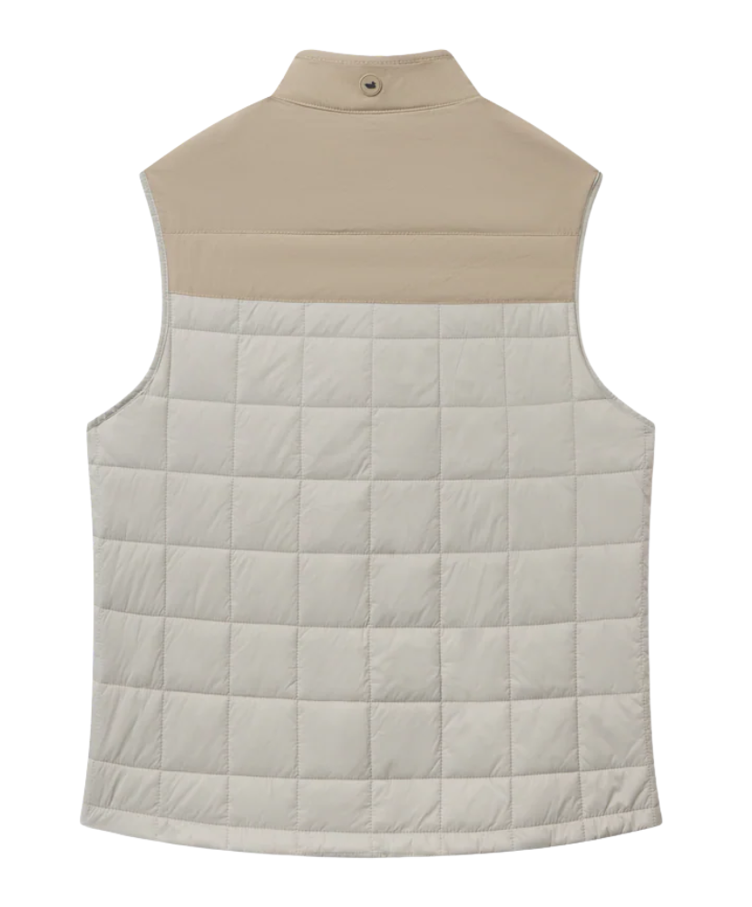 Beige and white quilted vest on a white background