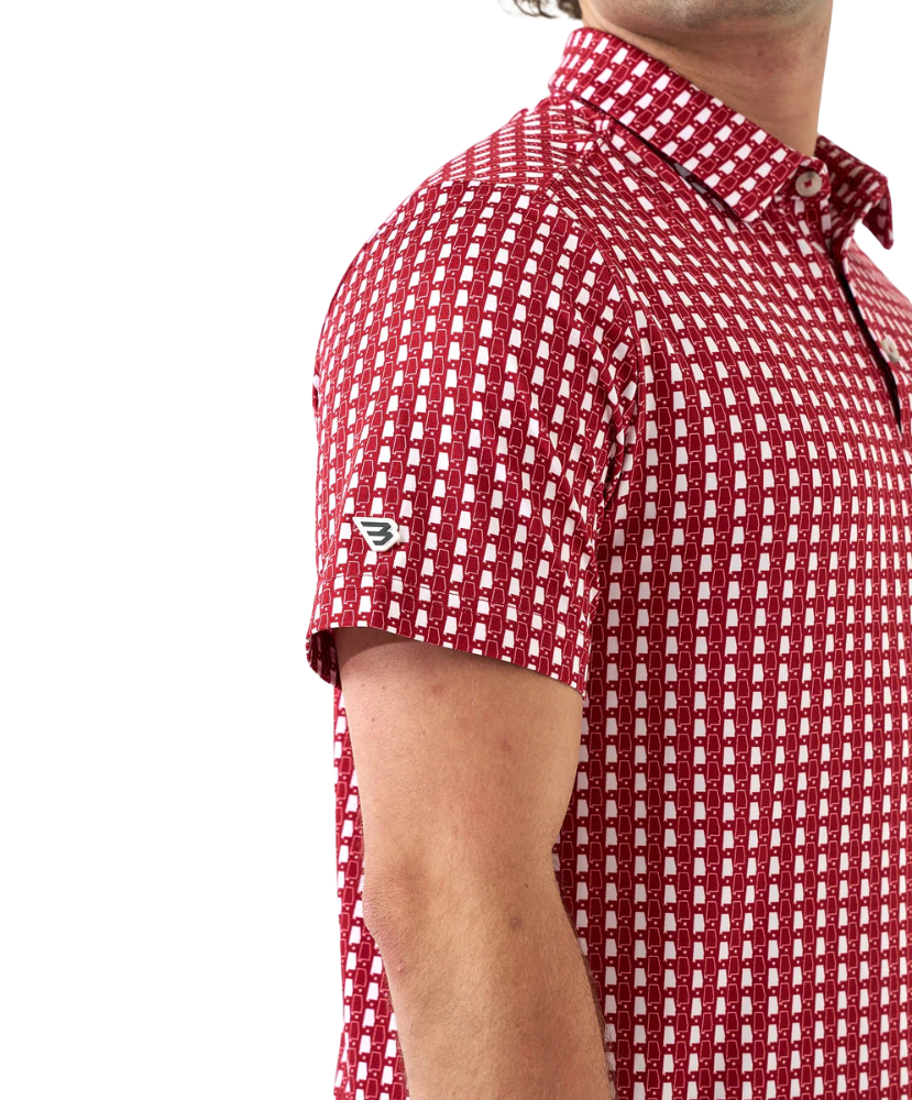 Man wearing red and white polo with Alabama state outline print. Perfect for Game Day.