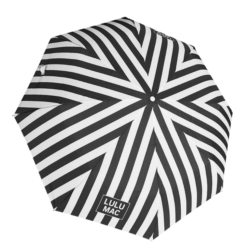 Black and white striped umbrella with 'LULU MAC' branding on a white background