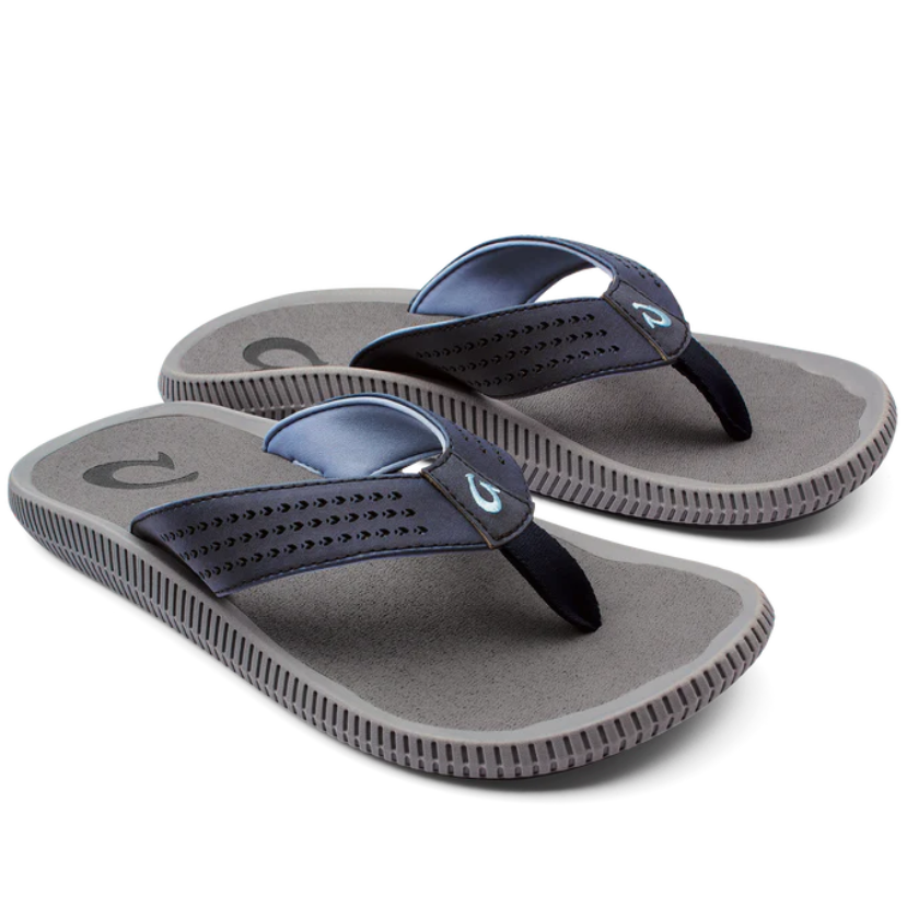 Pair of gray and navy sandals on a white background