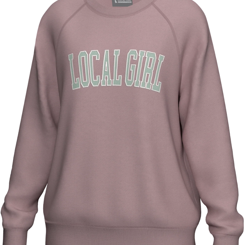 Pink sweatshirt with 'LOCAL GIRL' text on a white background