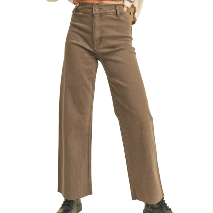Brown pants worn by a WOMAN on a white background