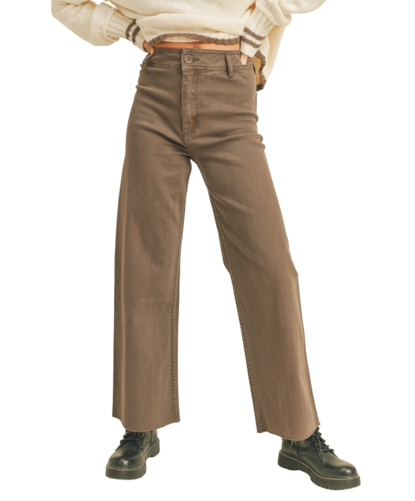 Brown pants worn by a WOMAN on a white background