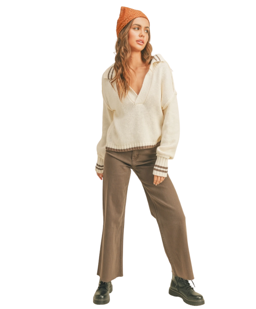 Brown pants worn by a woman on a white background