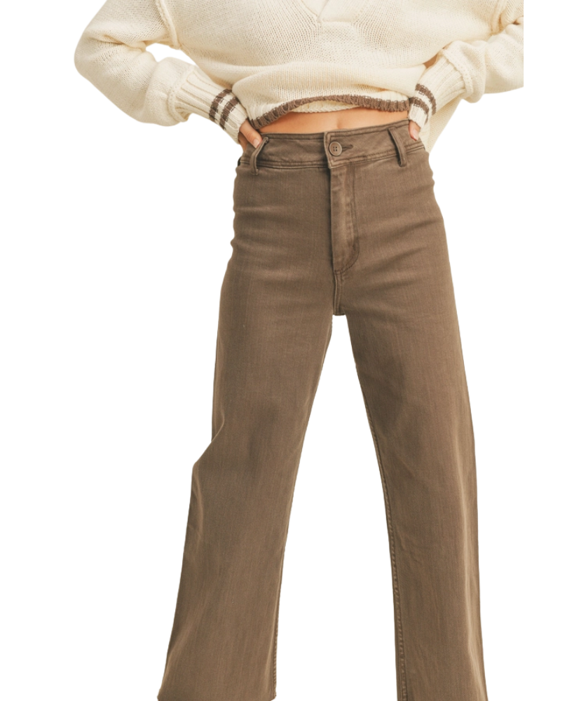 Brown pants worn by a woman on a white background