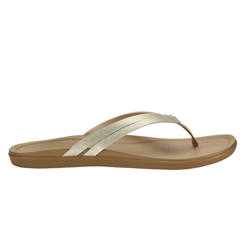 Beige OLUKAI sandal with a strap on a white background
