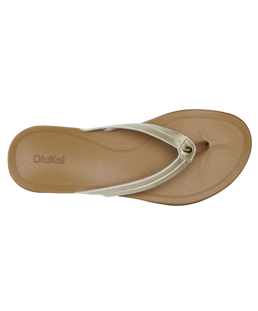 Beige OLUKAI sandal with a strap on a white background