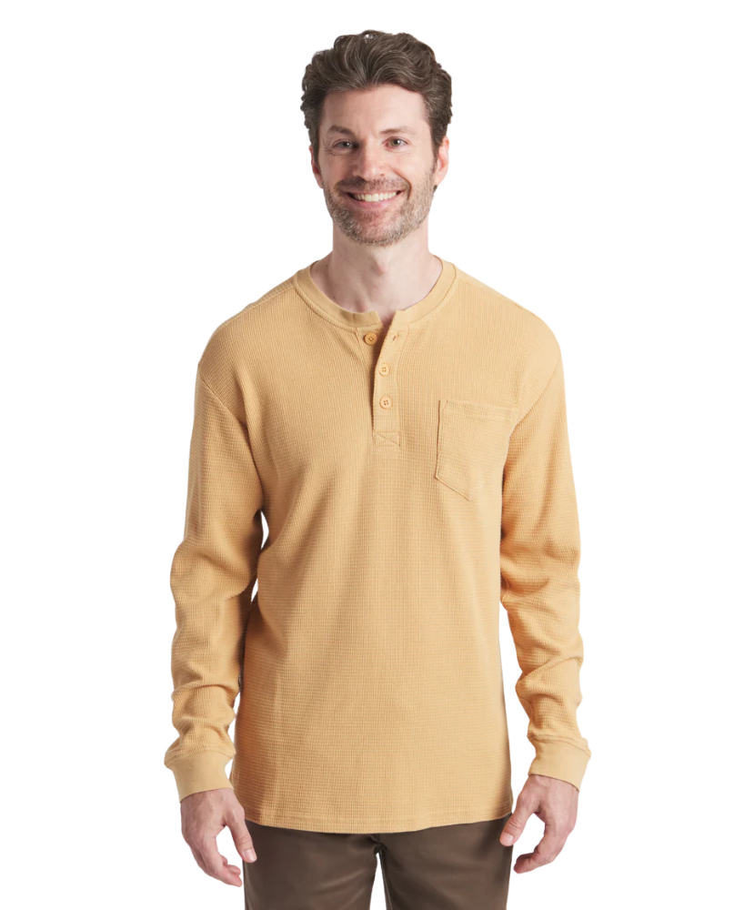 Man wearing a yellow long-sleeve henley shirt on a white background