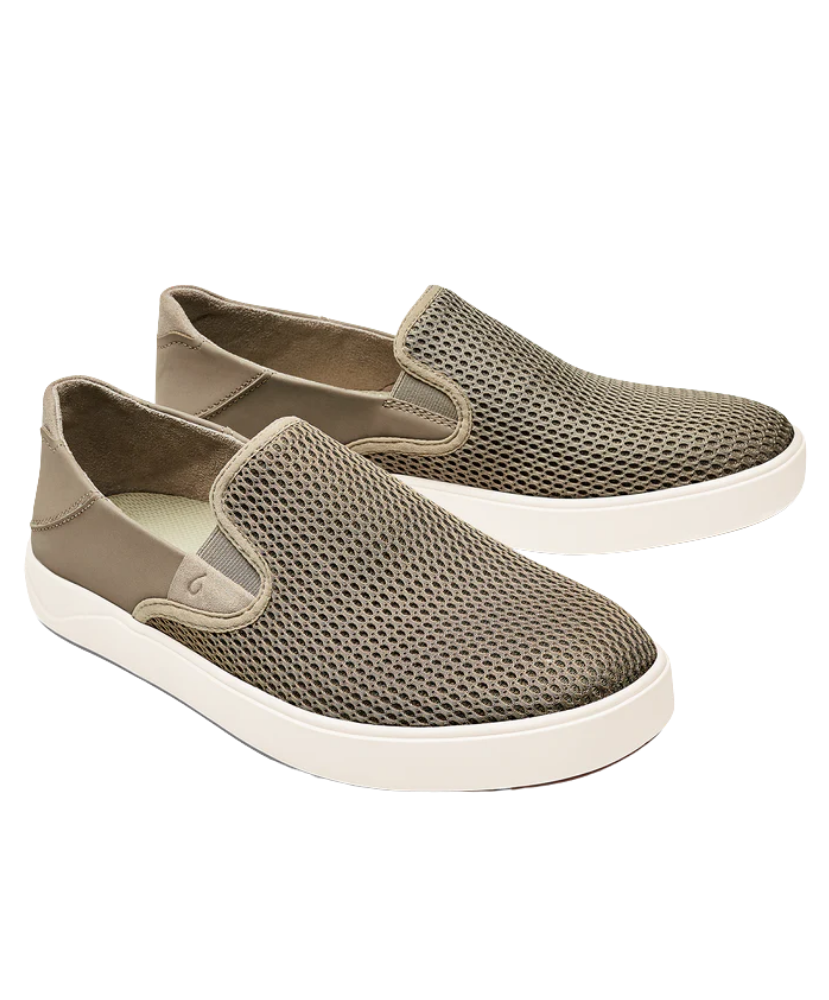 Pair of brown slip-on shoes with white soles on a white background