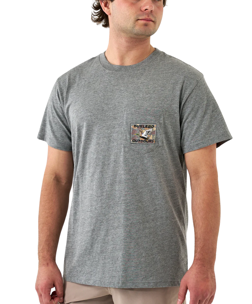 Man wearing a gray t-shirt with a Burlebo logo on a white background