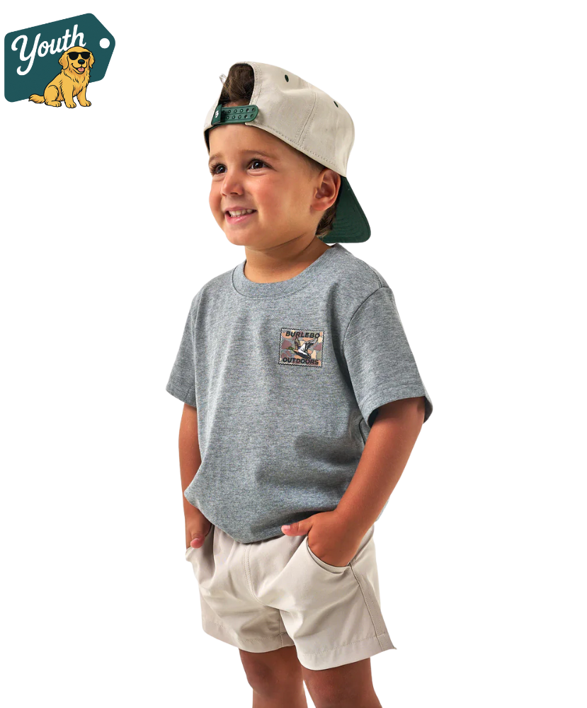 Child wearing a gray t-shirt with a Burlebo logo and beige shorts, standing against a white background with 'Youth' brand logo.